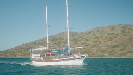 Wide-shot-of-historical-boat-cruising-across-the-ocean