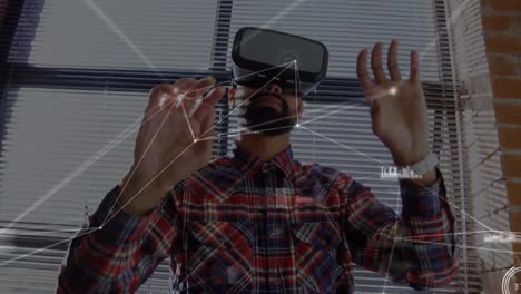 Animation-of-network-of-connections-over-man-wearing-vr-headset