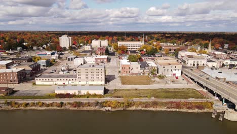Riverside of Saginaw, Michigan, USA and Saginaw River, aerial opening shot