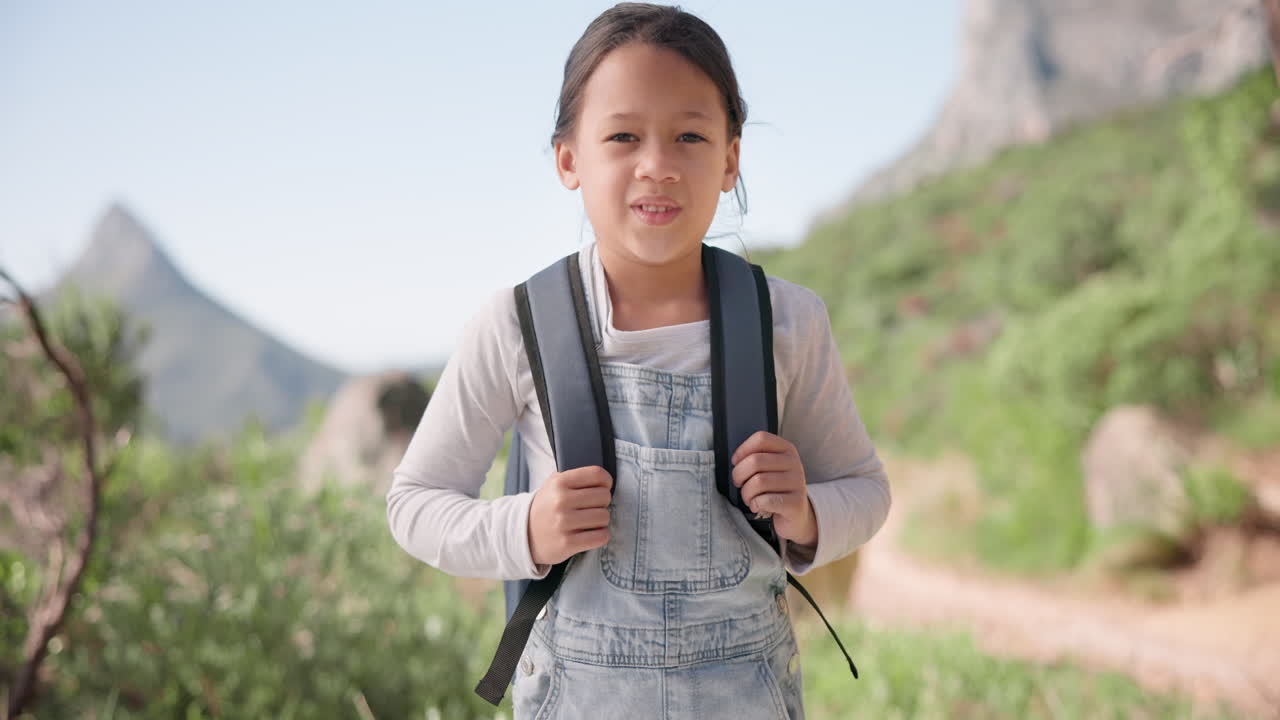 Smile, face and kid on a hike with backpack