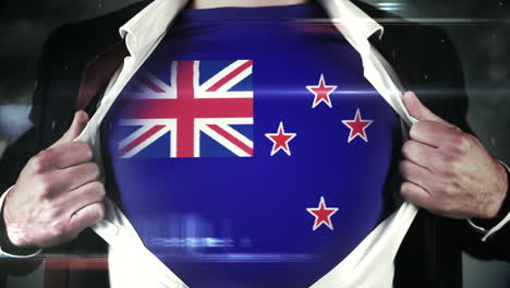 Businessman-opening-shirt-to-reveal-new-zealand-flag-