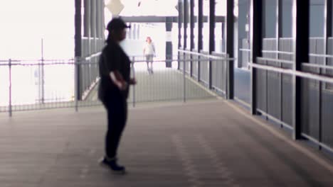 individual doing jump rope workout on a pier