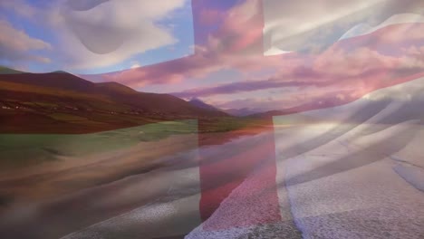 Animation-of-flag-of-england-blowing-over-beach-landscape