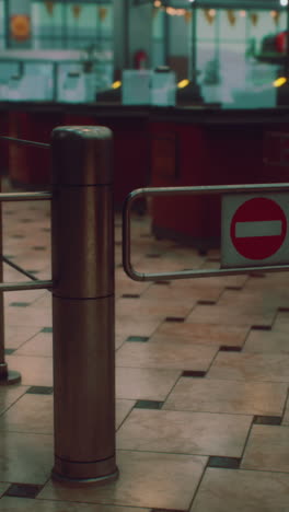 a close up of a gate entrance to a retail store