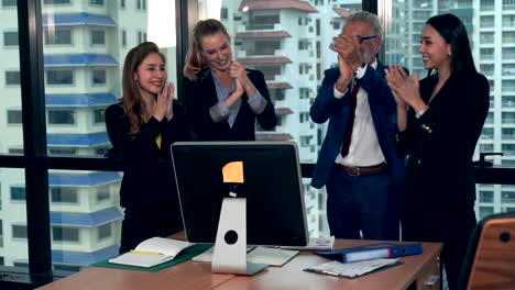 happy business people celebrate victory of success