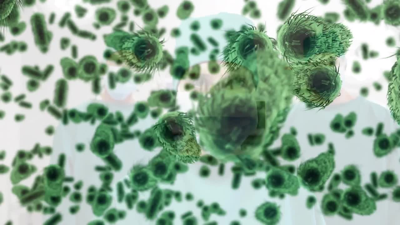 animación de células de covid-19 flotando sobre los cirujanos con máscara facial