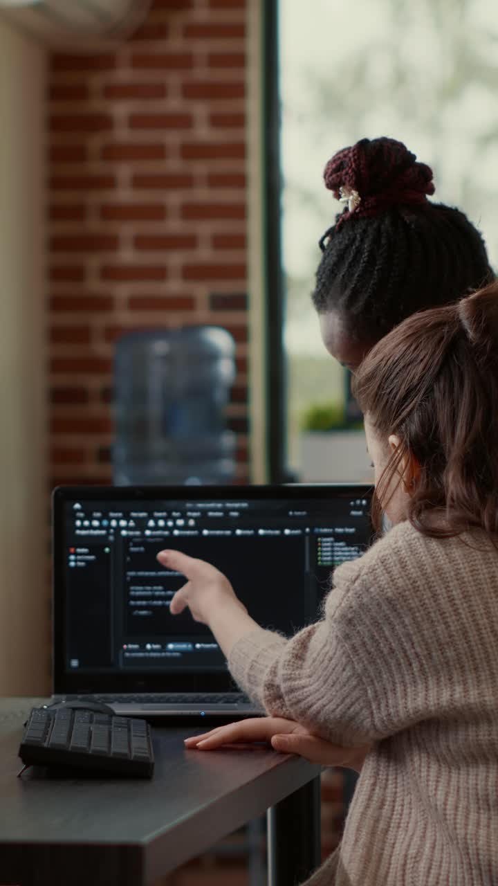 Software Developers Collaborating on Code