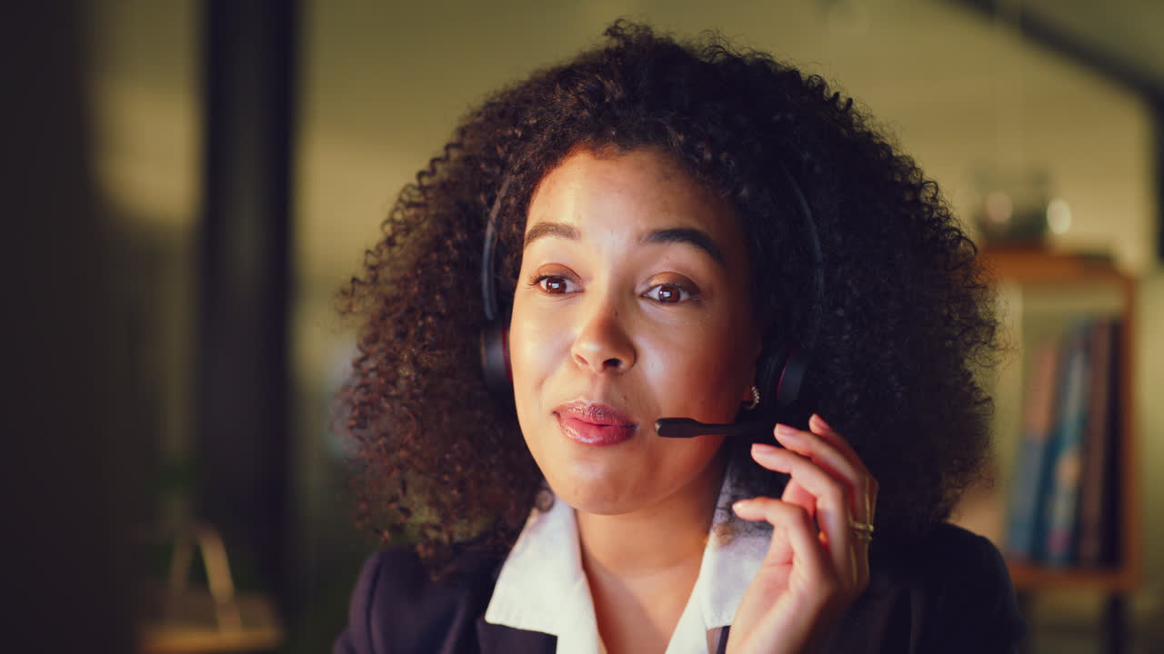 Young female call center agent talking