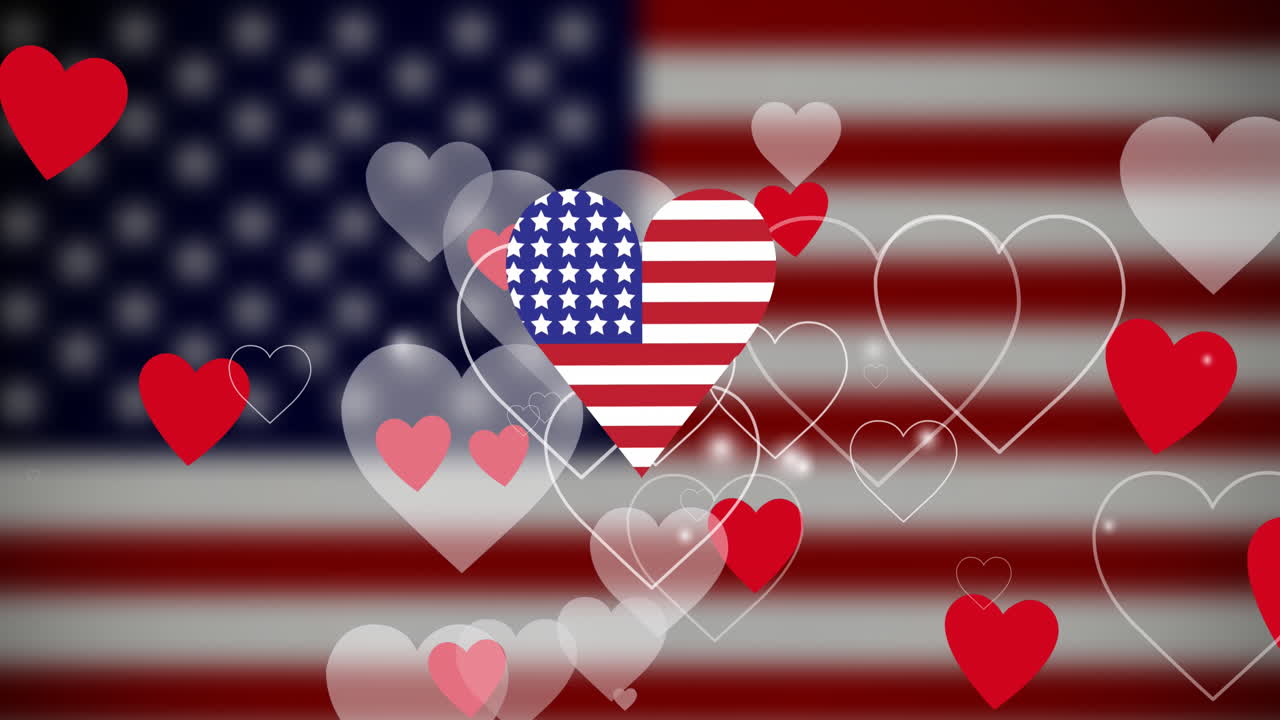 アメリカ合衆国の国旗の上にハートが重なるアニメーション。