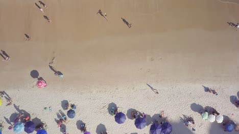 An-aerial-shot-of-beach-and-ocean-in-Guarapari-in-Brazil