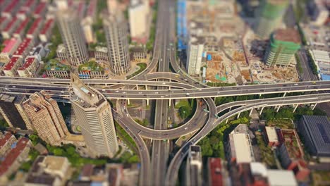 sunny day shanghai city famous traffic round road junction aerial top view 4k tilt shift china