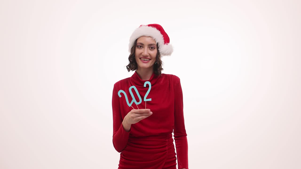 Woman in Santa Hat Celebrating New Year 2023