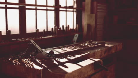 various carpenter tools and supplies in a garage