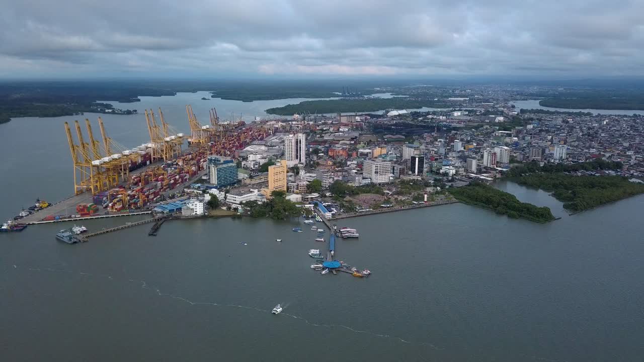 Aerial flyaway from the port and downtown in Buenaventura, Colombia