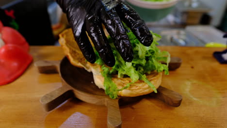 fresh greens on the grill: adding crisp lettuce to the perfect burger