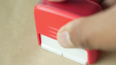 close up of a red stamp