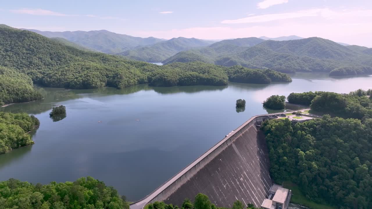 aerial push in to fontana dam and reservoir