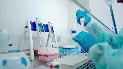 biochemical analyzing by lab worker. scientific medicine research probes test glasses tubes in modern lab