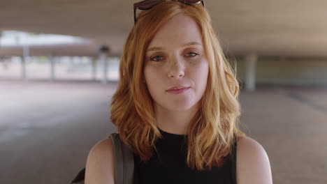 portrait of young red head woman looking to camera disappointed sad