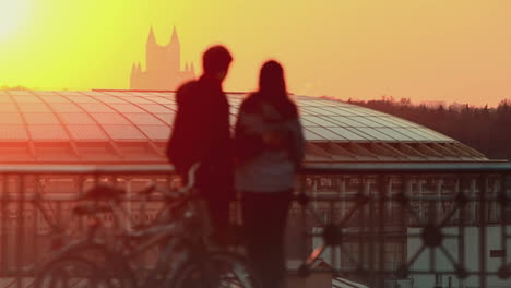 young couple at sunset in the city