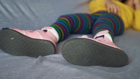 child with orthopedic shoes