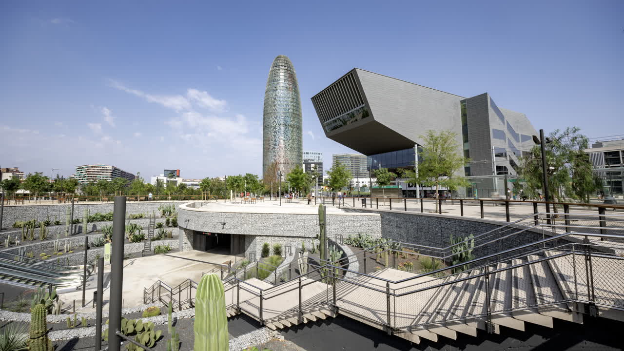 Timelapse of Glories Metro Station In Barcelona and skyline