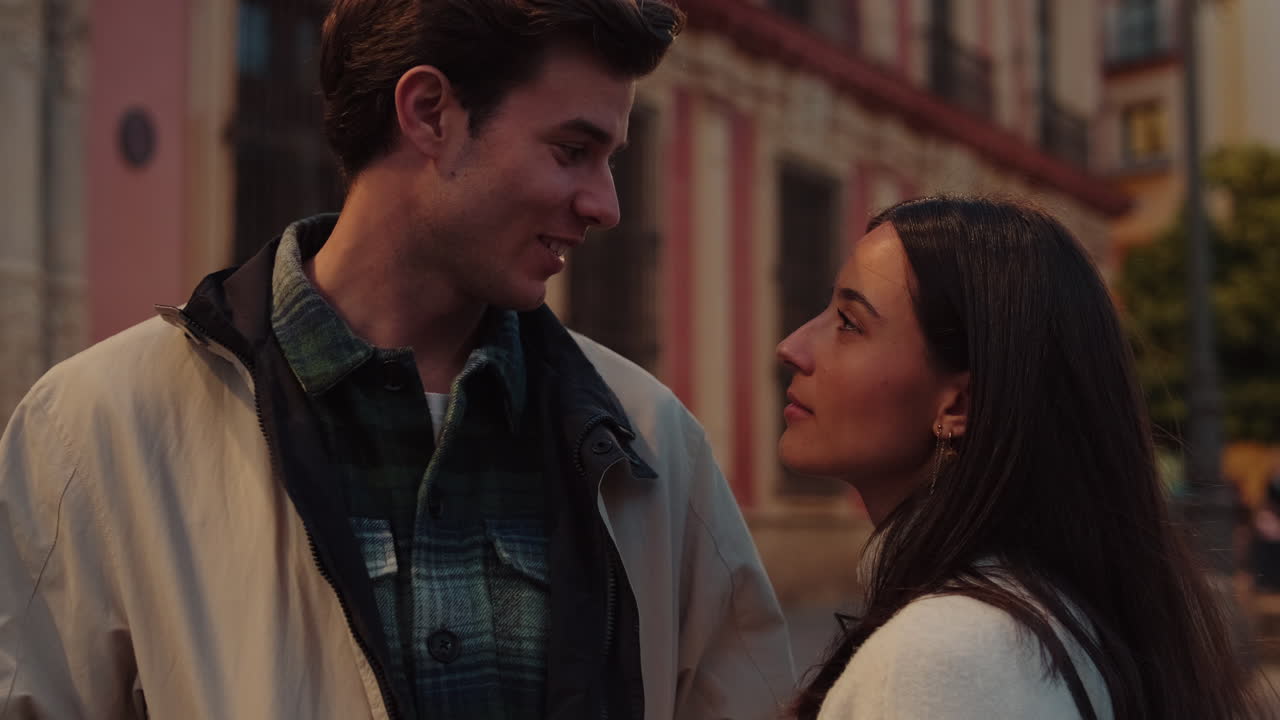 Couple in Love on Seville Street at Sunset