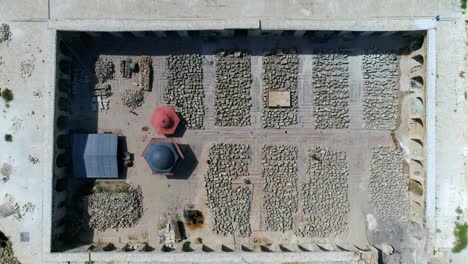 aerial view with a drone above the ruins of the umayyad mosque in aleppo. the mosque is in ruins even 10 years after the civil war 4k