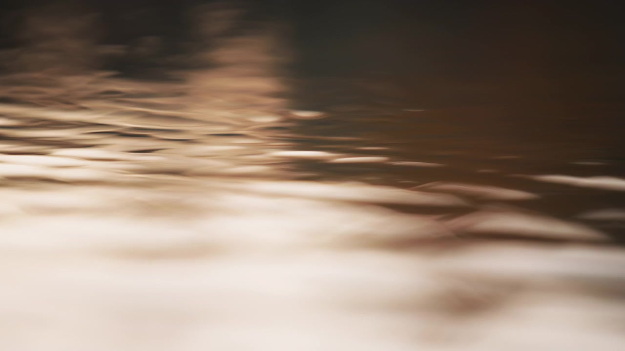 Wavy lake water at dusk