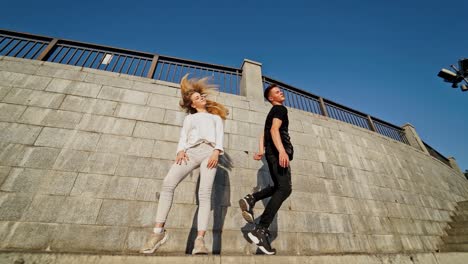 couple dancing at outdoor. young couple dancing together outside