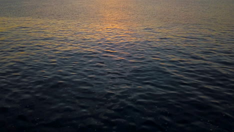 Aerial-Drone-Shot-of-Open-Water-Ocean-Sunset,-Mediterranean-Sea-off-The-Coast-of-Elba,-Italy