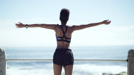 woman enjoying the view at the beach