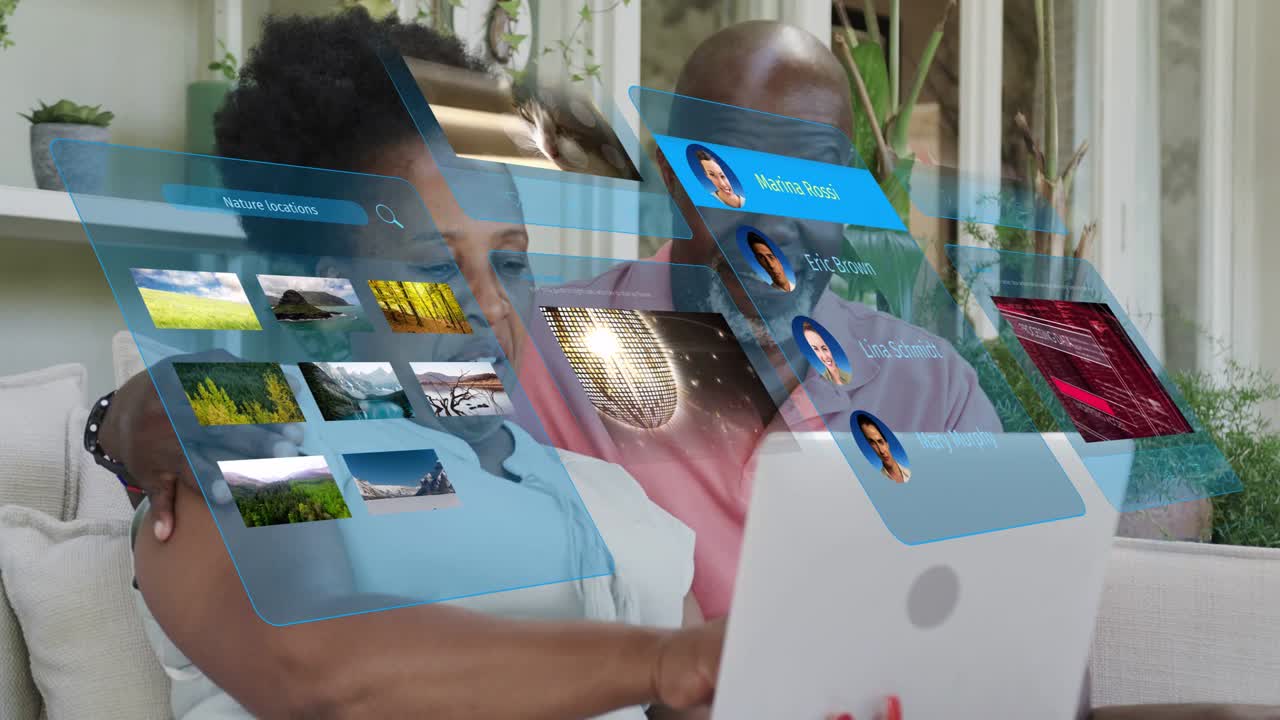 Couple on couch, woman tapping laptop, scrolling holo thumbnails, stacking contacts for technology