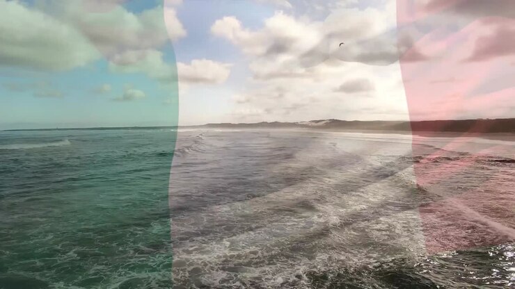 Animazione di bandiera dell'Italia che sventola sopra mani che formano il segno dell'okay su un paesaggio balneare