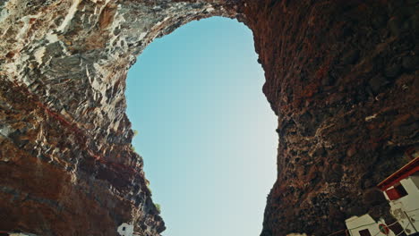 panoramic view inside the porís de candelaria in palma island, canary islands, spain. fishing village inside a rugged coastline cave. hidden gem.