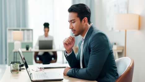 Man-at-desk,-laptop-and-thinking-in-coworking