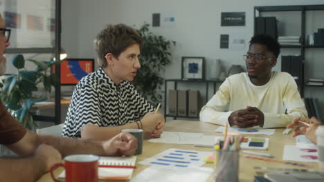 multiethnic coworkers on office meeting