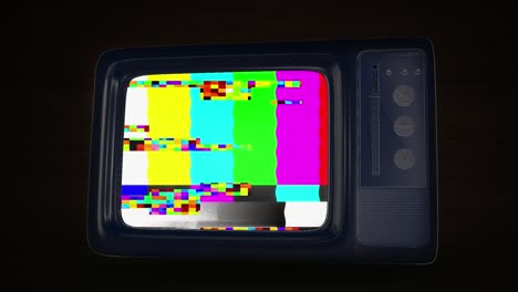vintage televisions with static and green screen