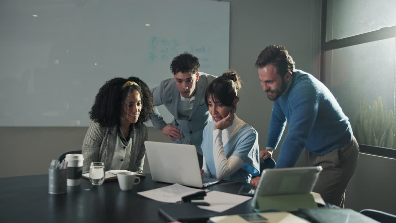 Excited Team Collaborating on Project Success