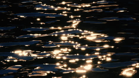 the sea's surface glittered with sparks