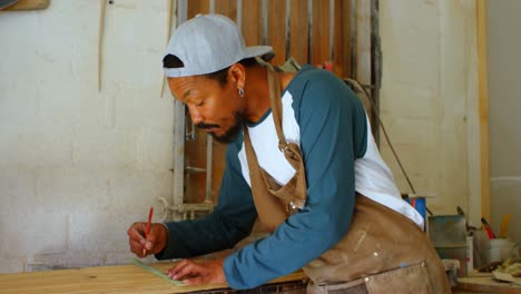 surfboard maker measuring surfboard 4k