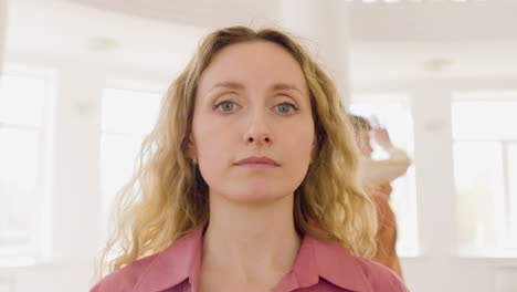 close up view of woman dancer looking camera in the studio