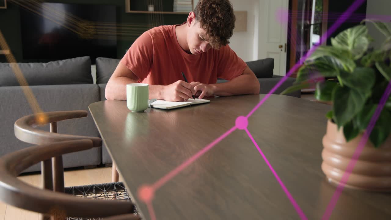 Man writing notebook at table, pen moving, animated nodes sweeping near hands then fading for study