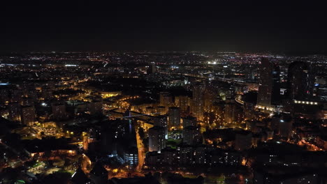 by night, paris' financial core contrasts ancient streets with modern luminosity