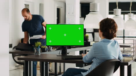 Specialist looks at greenscreen template