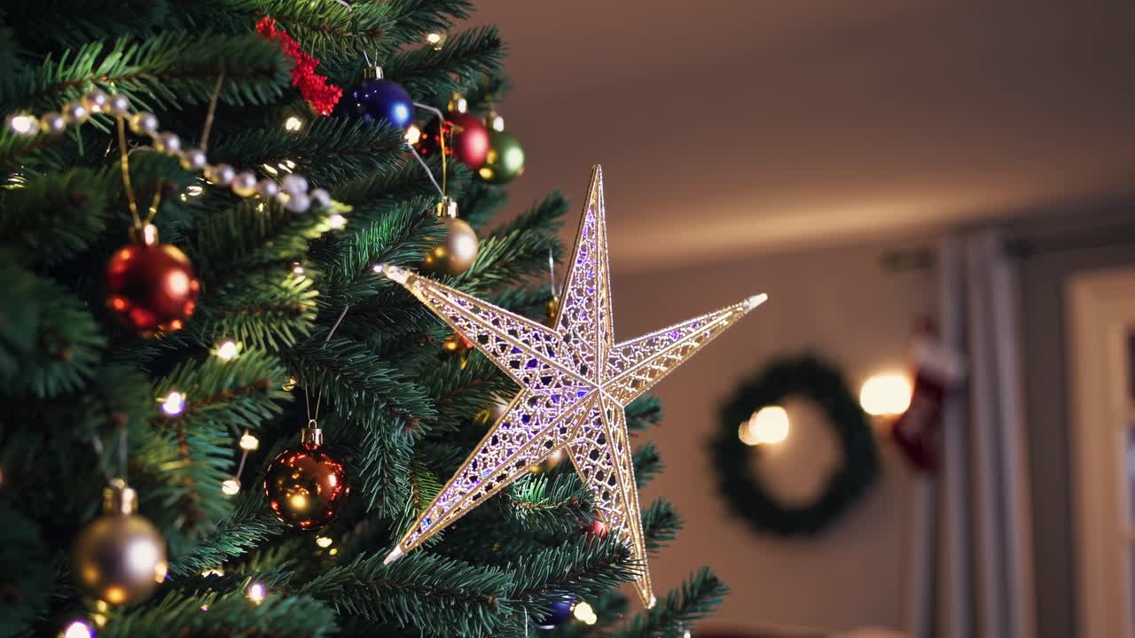 Festive close-up of a decorated Christmas tree with ornaments and lights