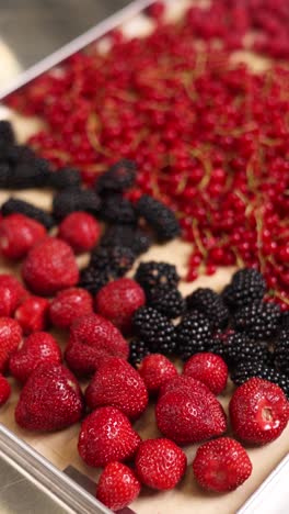 assortment of fresh berries on a tray