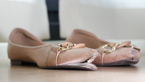 broken beige flat shoes