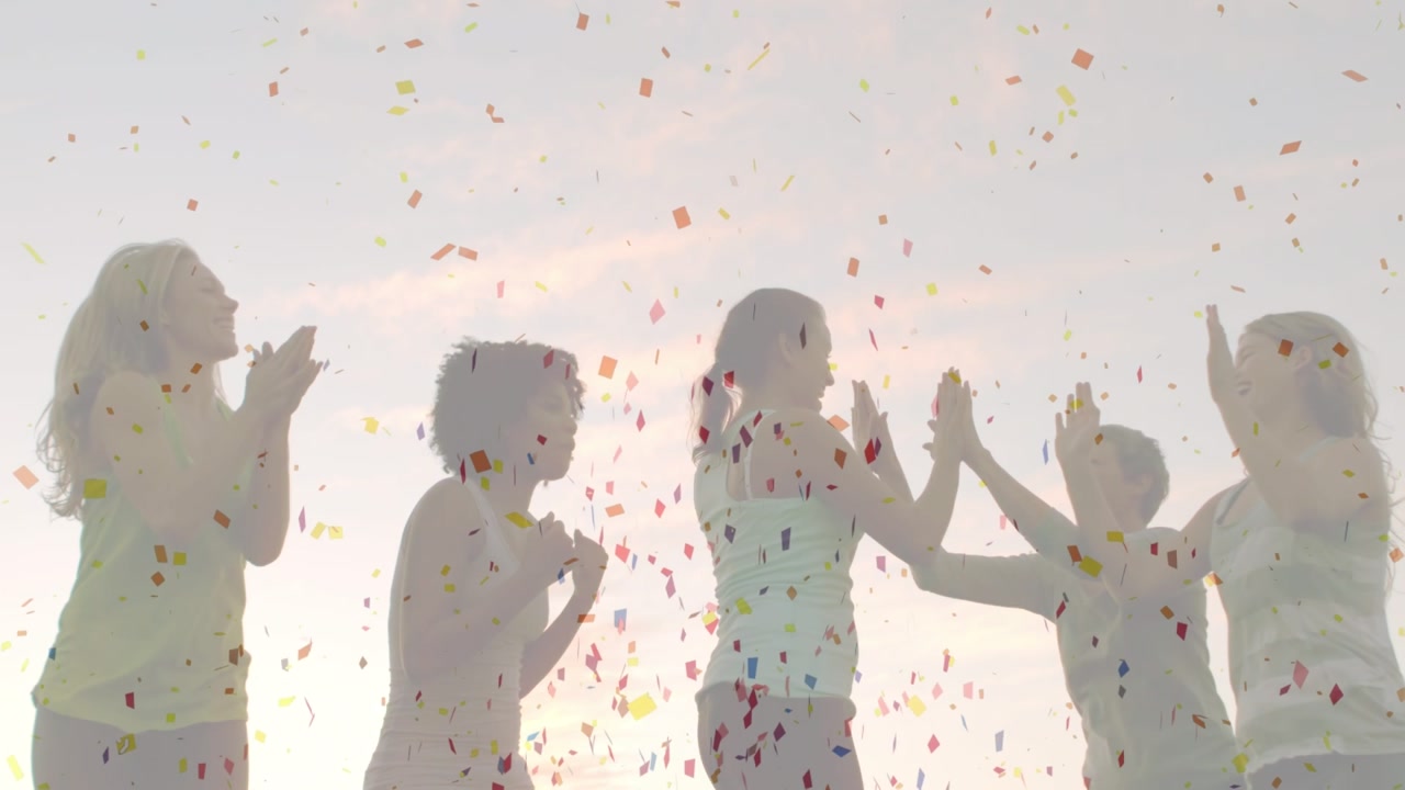 Animation of confetti falling over smiling emoji icon on white background
