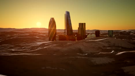 rascacielos de la ciudad en el desierto al atardecer